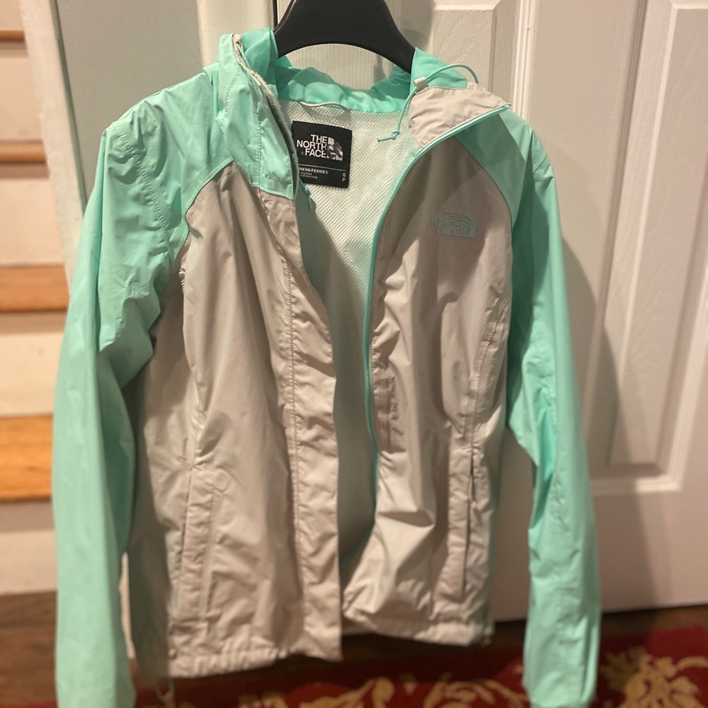 Gray and mint green rain coat